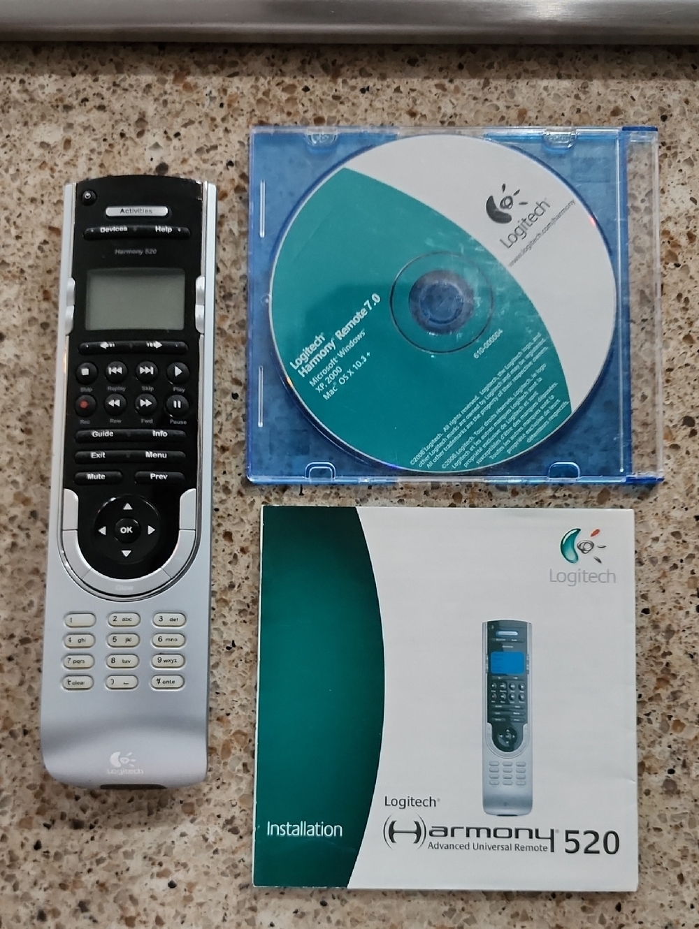 Logitech Harmony 520 Remote with Teal CD and White Manual